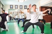 Tai chi practitioners work out together in Zhenglei Tai Chi Academy.jpg