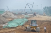 12 土方工程是目前京秦高速建造中最耗时费力的内容，裴睿等工程师认为未来的高速公路将从营造结构上改善，从而减少对土方的依赖。.jpg