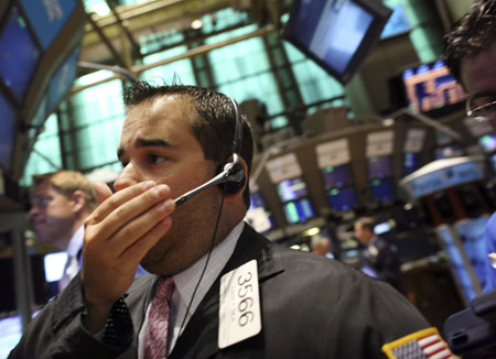 Wall Street ended lower on Monday as investors are nervous that the swine flu outbreak could spread and block economic recovery.
