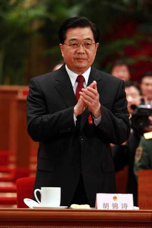 Hu Jintao, general-secretary of the Central Committee of the Communist Party of China, is reelected president of the country and chairman of the Central Military Commission of China during the fifth plenary meeting of the NPC session in Beijing, capital of China, March 15, 2008. (Xinhua Photo)