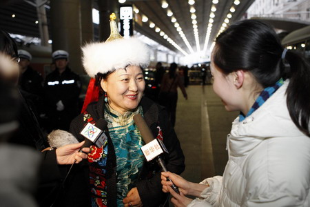 Members of CPPCC arrive in Beijing for session 