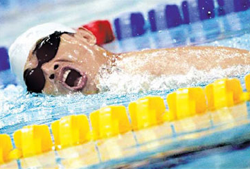 Swimmer leaves pool for pig farm